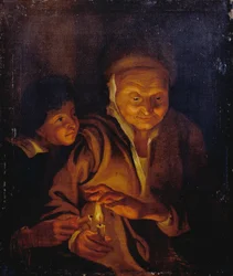 Ein Junge zündet eine Kerze an, die eine alte Frau hält